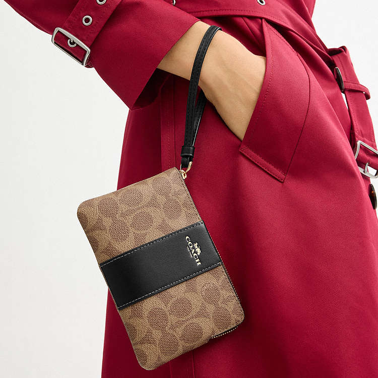CARTERA DE MANO CON CREMALLERA COACH