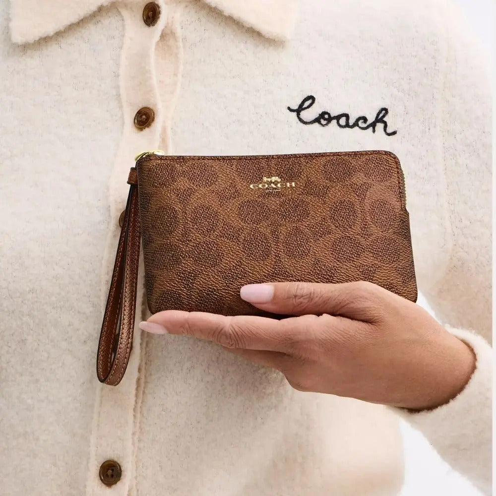 CARTERA DE MANO CON CREMALLERA COACH