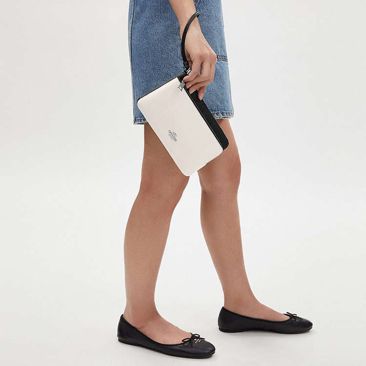 CARTERA CON DOBLE CREMALLERA COACH