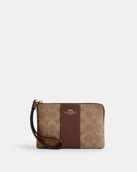 CARTERA DE MANO CON CREMALLERA COACH