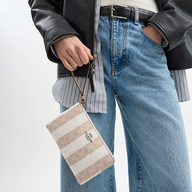 CARTERA DE MANO COACH
