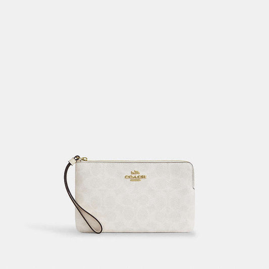 CARTERA DE MANO COACH